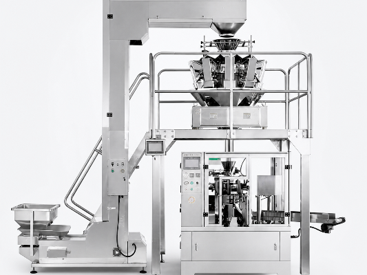 Premade-pouch packaging equipment for the finished-product handoff.