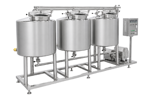 Three-tank CIP skid: tanks, supply header, pump and panel carried on a single frame.